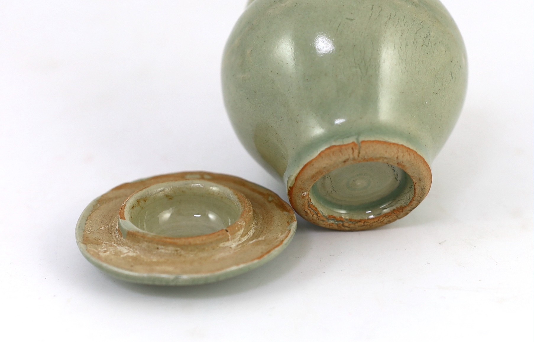 A Chinese celadon small baluster jar and cover, Southern Song dynasty or later, 8cm high